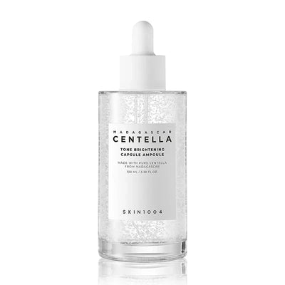 Skin1004 Madagascar Centella Tone Brightening Capsule Ampoule bottle with pipette and visible micro-capsules