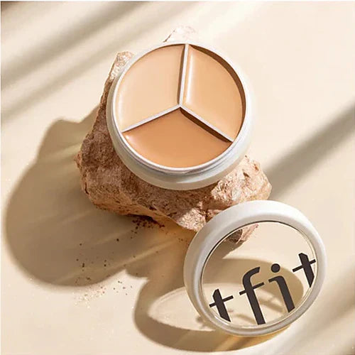 TFIT Cover Up Pro Concealer palette open showing three shades in balm format